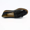 Black patent leather loafers with tassels for women