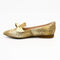Gold leather flats with bow